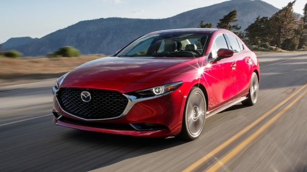 2019-Mazda-Mazda3-Premium-Sedan-front-three-quarter-in-motion-1